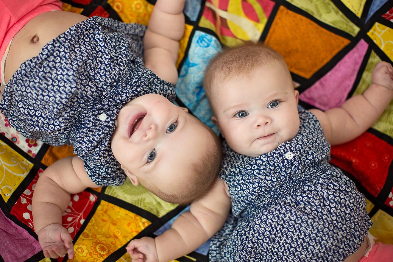 4 four month old twin baby girls by Dallas Ft. Worth best multiples photographer Sunny Mays