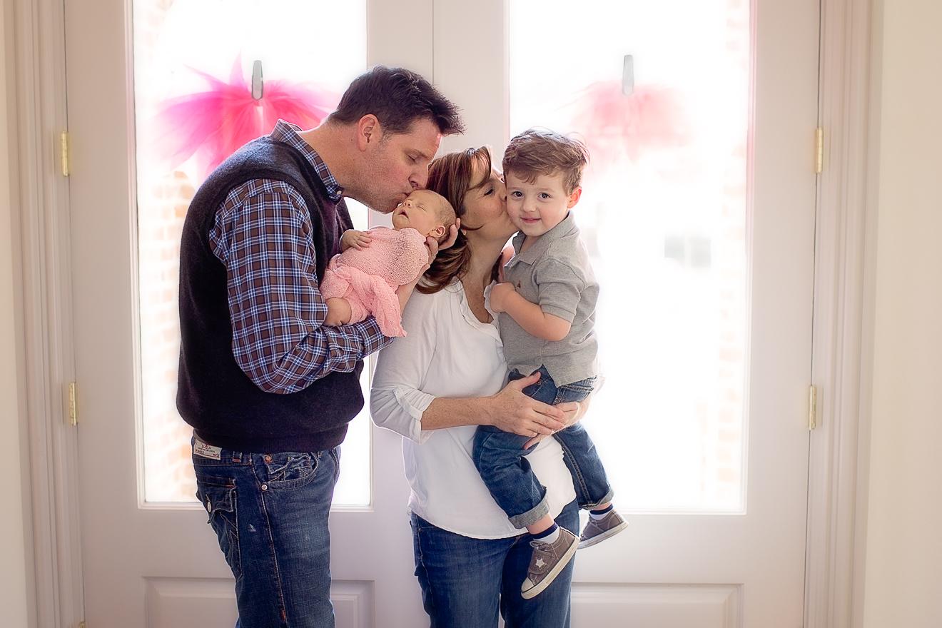 Family lifestyle image with newborn baby girl Sunny Mays Photography