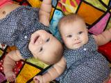 4 four month old twin baby girls by Dallas Ft. Worth best multiples photographer Sunny Mays